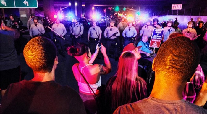 Police arrest 2, fire pepper balls at protesters in El Cajon, California 